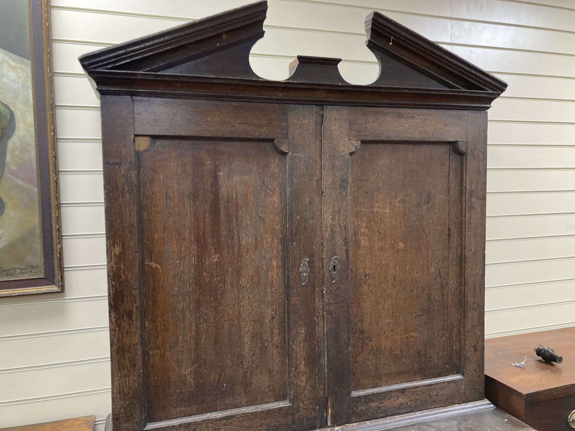 A mid 18th century oak linen press, length 120cm, depth 54cm, height 217cm